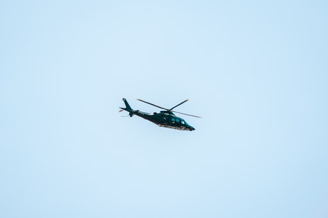 helicopter in blue sky